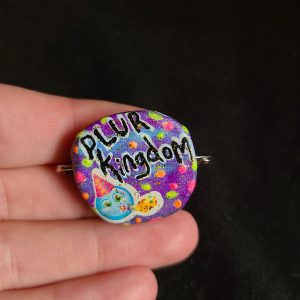 Party! PLUR Kingdom bottle cap pin